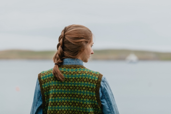 Fair Isle Knitting Patterns - woman wears a knitted slipover