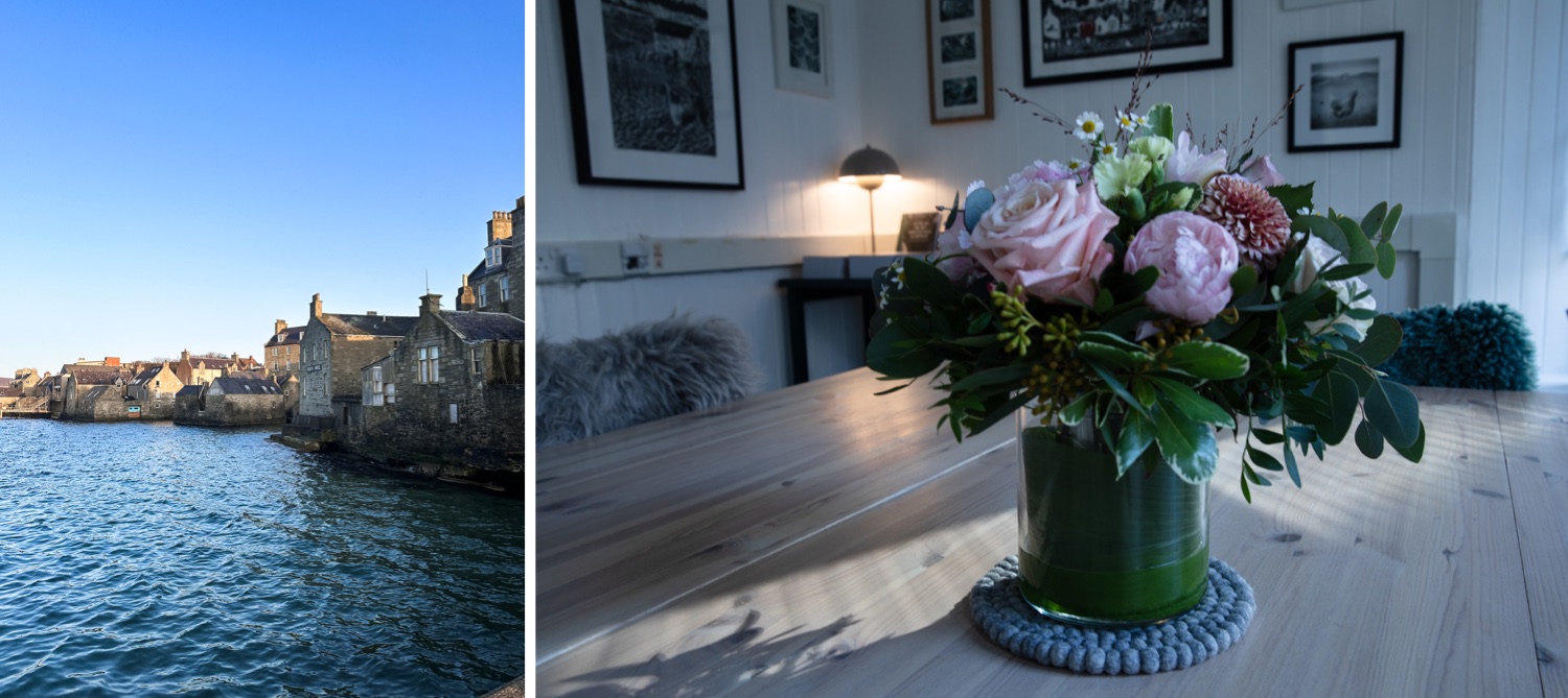 Image of fresh flowers on a wooden table to welcome visitors for their Shetland Knitting Tour